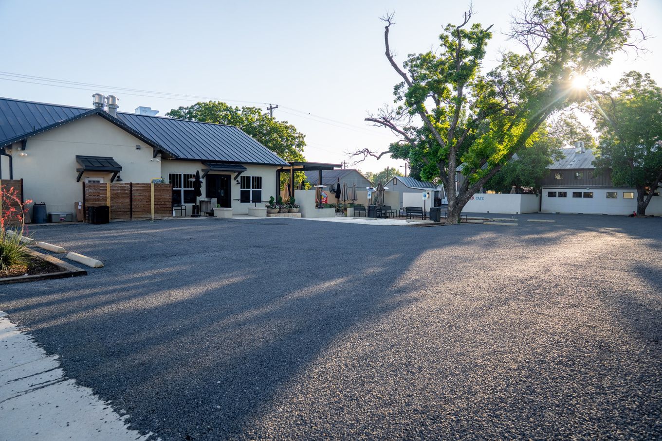 Finished aggregate surface across a commercial parking area