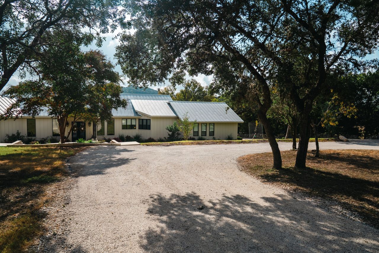 Prepared aggregate access surface around a rural property