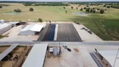 Commercial parking lot installation in Kerrville, TX by Rafferty Paving LLC.