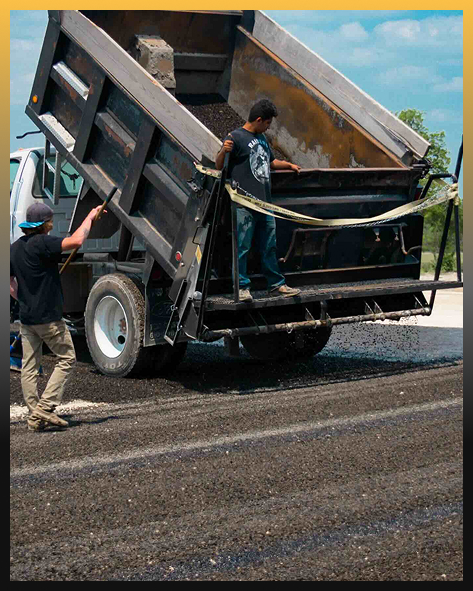 Rafferty Paving team performing crack repair on a Kerrville parking lot.