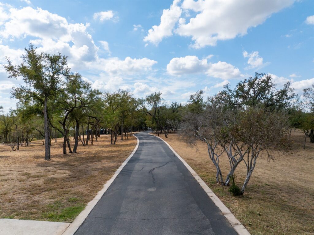 Private asphalt road built by Rafferty Paving in the Texas Hill Country