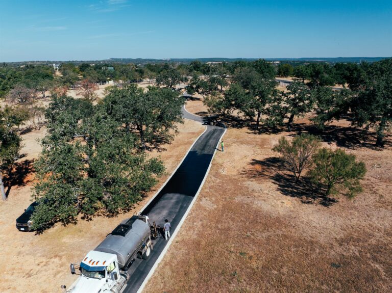 Rafferty Paving crew paving a private road through the oaks