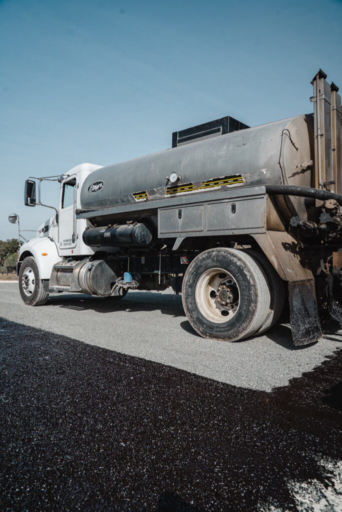 Rafferty Paving asphalt distributor truck on a job site