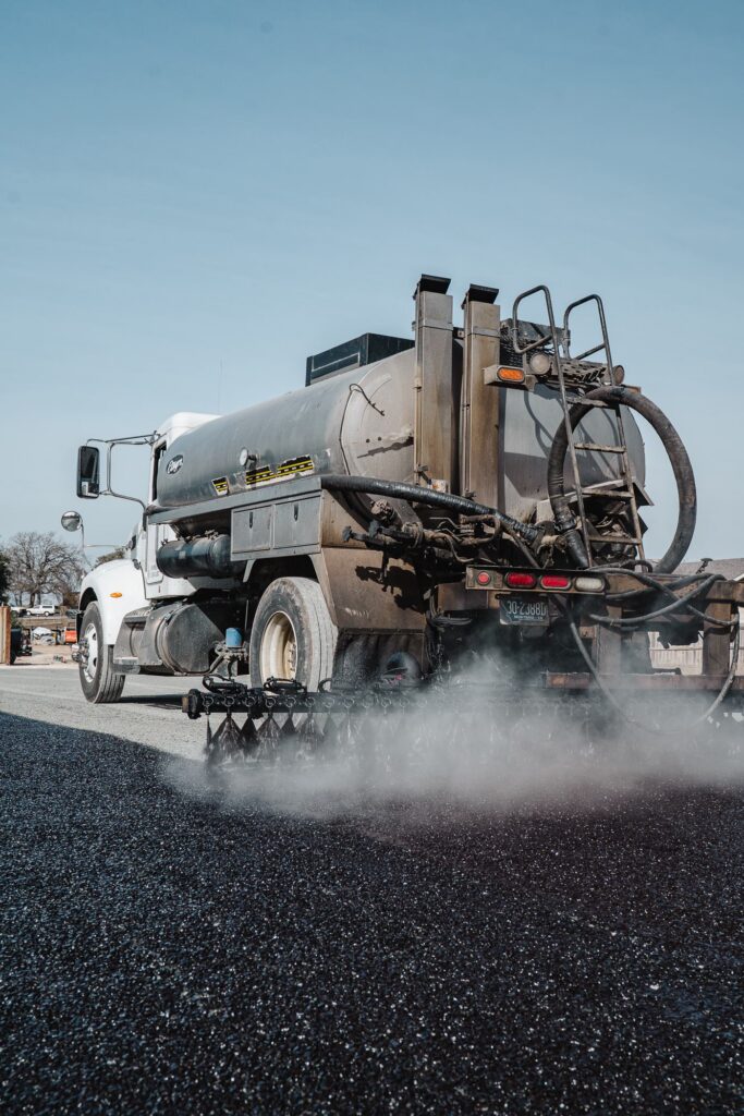 Rafferty Paving asphalt distributor truck on a job site